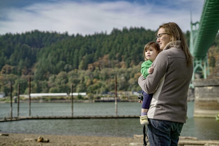 Adrienne and her daughter looking at the lake