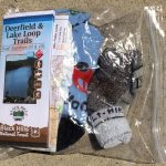 Wool socks, spare leggings, 2 diapers and trail guides fit in a gallon-sized plastic bag.