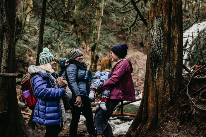 women and mothers hiking with kids