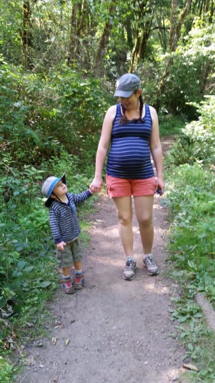 Pregnant mom and toddler hiking