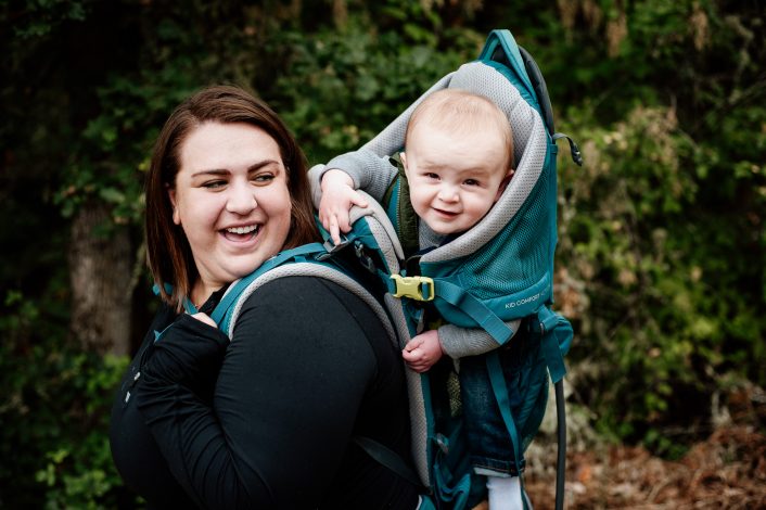 mom and baby on a hike using a child carrier