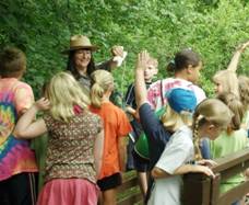 Park Ranger Cathy leads a tour of schoolchildren.