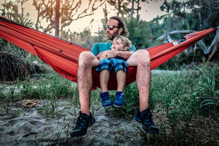 Dad and son in a hammock