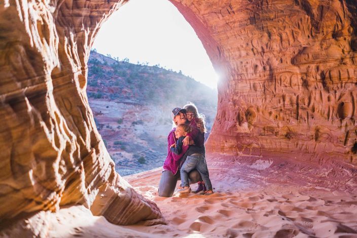 mom with kids in the outdoors on a hike