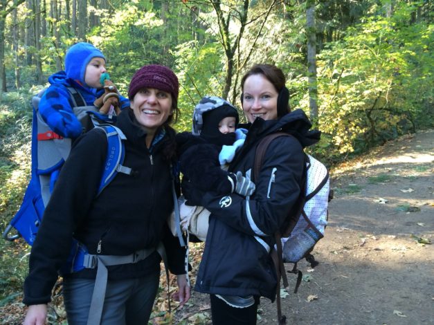 2 women and 2 babies bundled up to go hiking on a 30 degree day