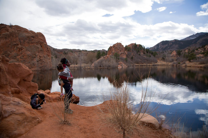 Mom and Daughter looking at a desert lake