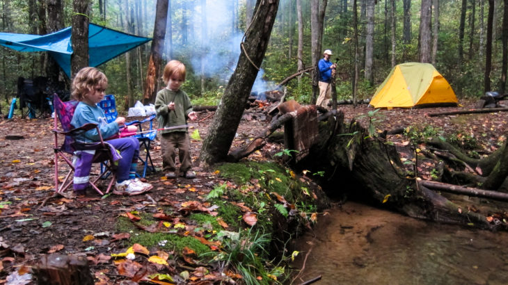 children by campfire