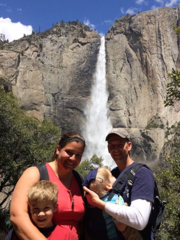 Tay-Sachs and Hike for Grayson by Felicia Kemp for Hike it Baby (Image of a family of four in front of a waterfall, one kid in a carrier)