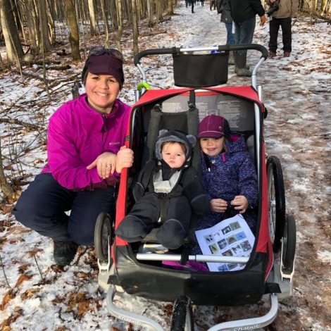 mom with kids in running stroller