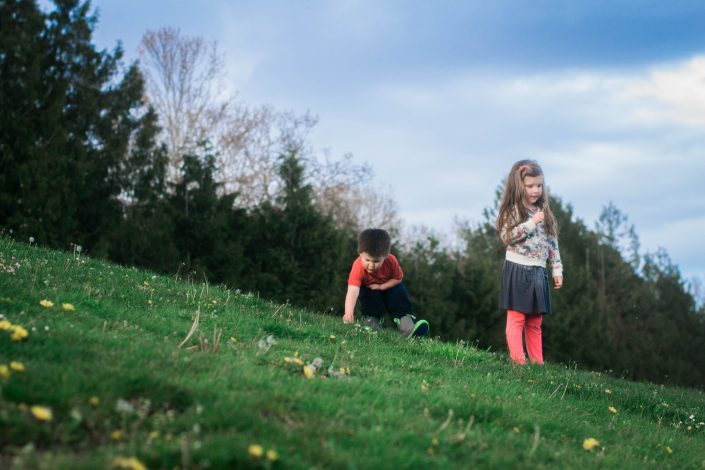 young kids playing in the grass