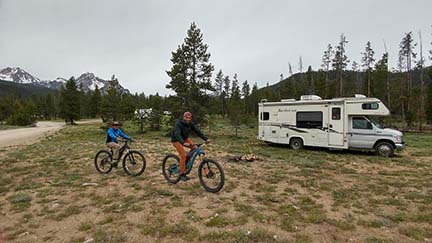 family in front of their RV