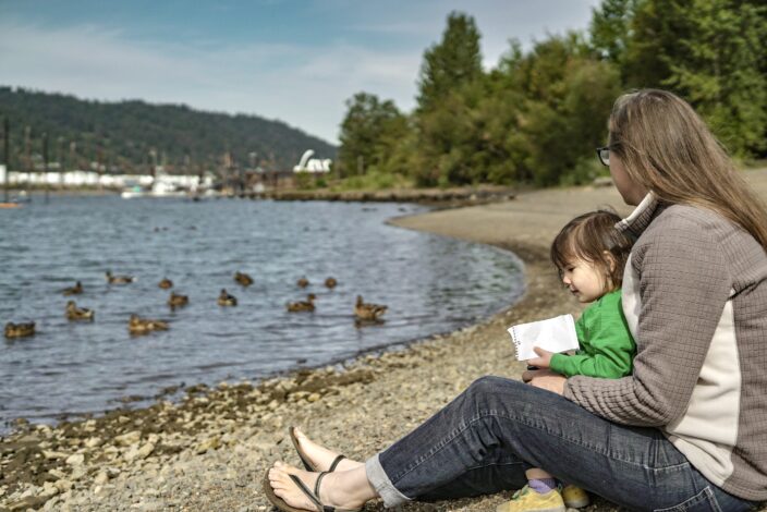 Adrienne and her daughter looking at the lake